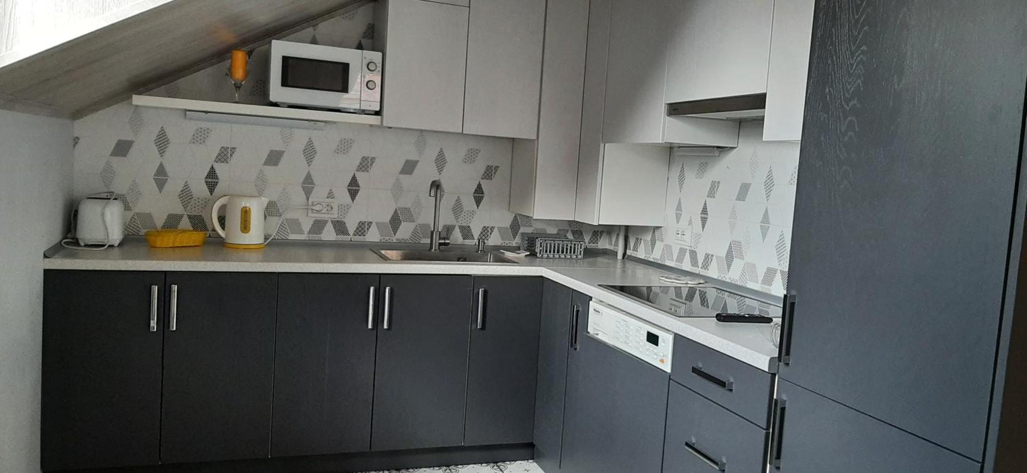 Apartamento Сонячна Мансарда Kamianets-Podilskyi Exterior foto