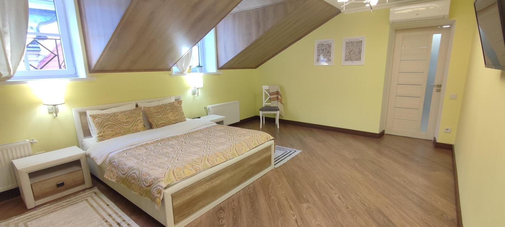 Apartamento Сонячна Мансарда Kamianets-Podilskyi Exterior foto